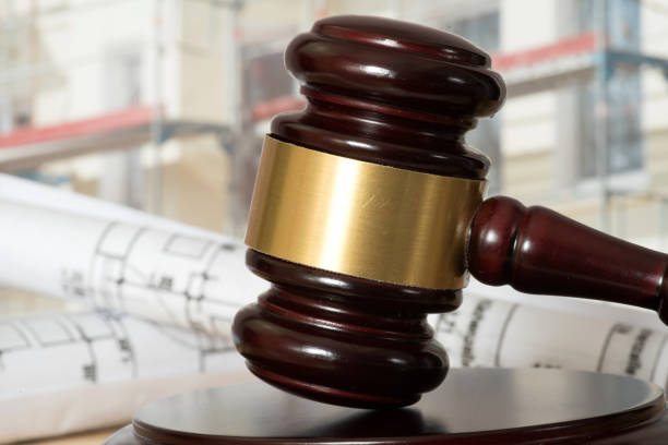 A judge's hammer, building law and the building plans